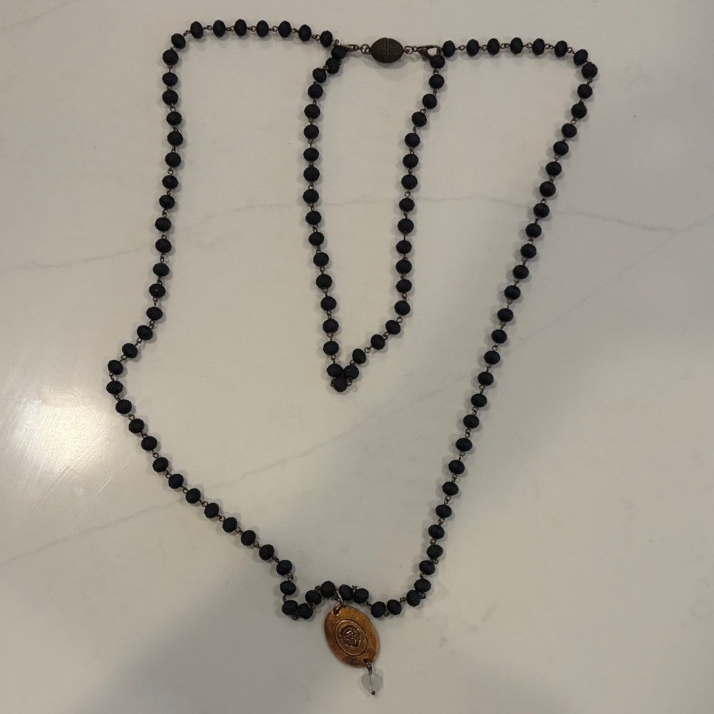 Black Beaded Necklace with Gold Medallion and Clear Accent